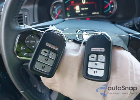 2021 Honda Passport 2Wd Touring from USA, damaged, VIN 5FNYF7H90MB006515